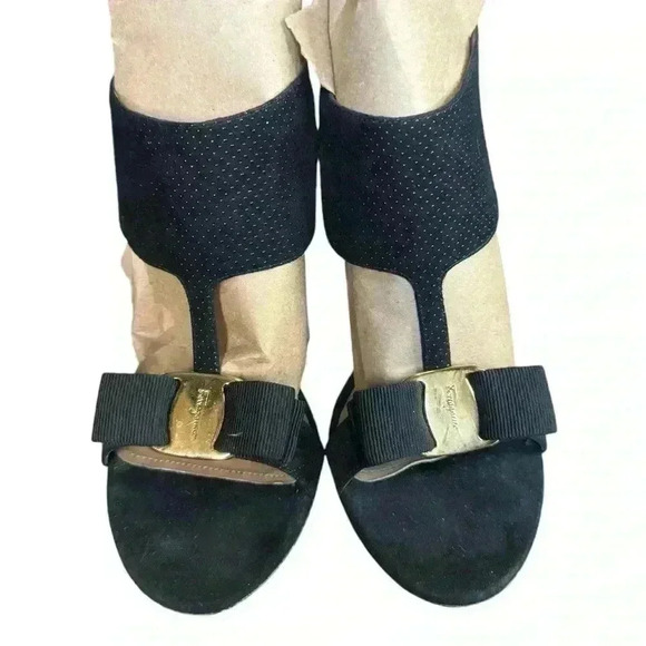 Salvatore Ferragamo pebbled suede bow detail.